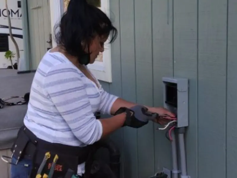 Licensed electrician wiring an exterior subpanel in Moorefield