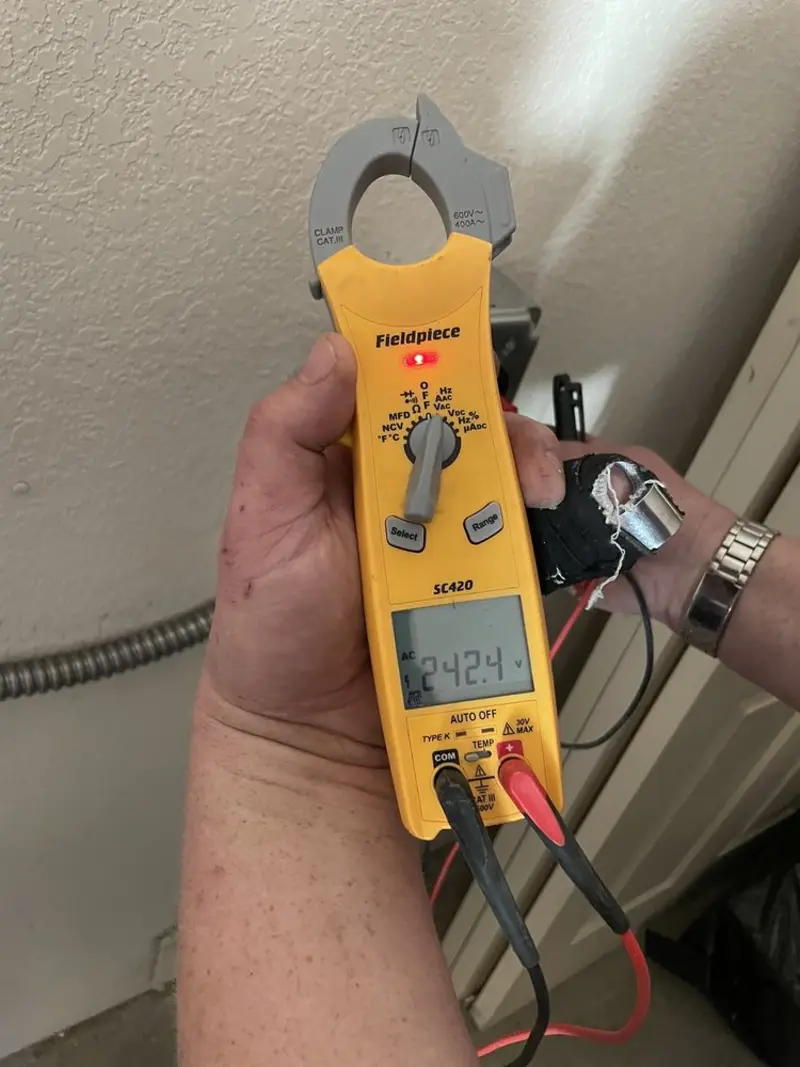 Voltage testing with clamp meter during Generator Installation in Moorefield